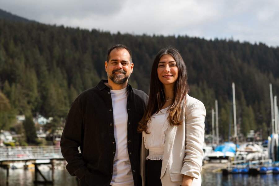 Dental Pathways Founders, Zahir and Elif Nathoo - with trees and ocean in the background.